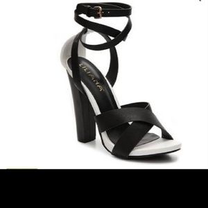Black and white block heeled shoes